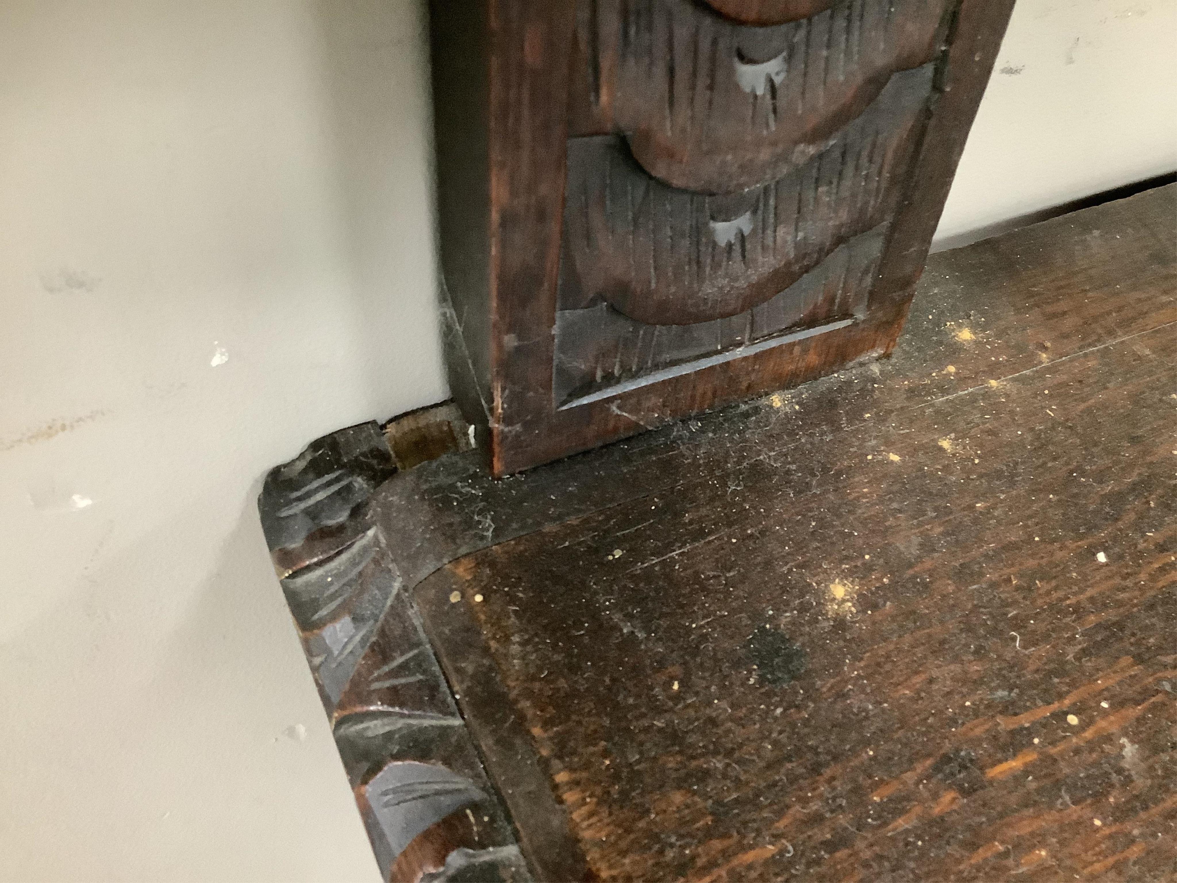 A late 19th century Flemish carved oak buffet, width 150cm, depth 55cm, height 155cm. Condition - fair